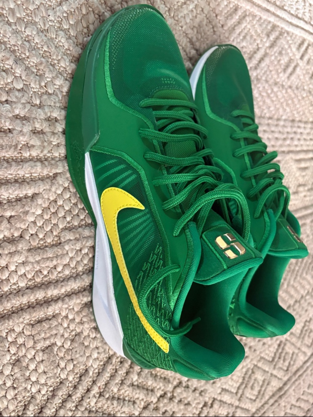 Nike Green Low-Top Sneakers with Yellow Swoosh
